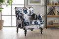 Fauteuil club décoratif en tissu imprimé floral avec garniture cloutée