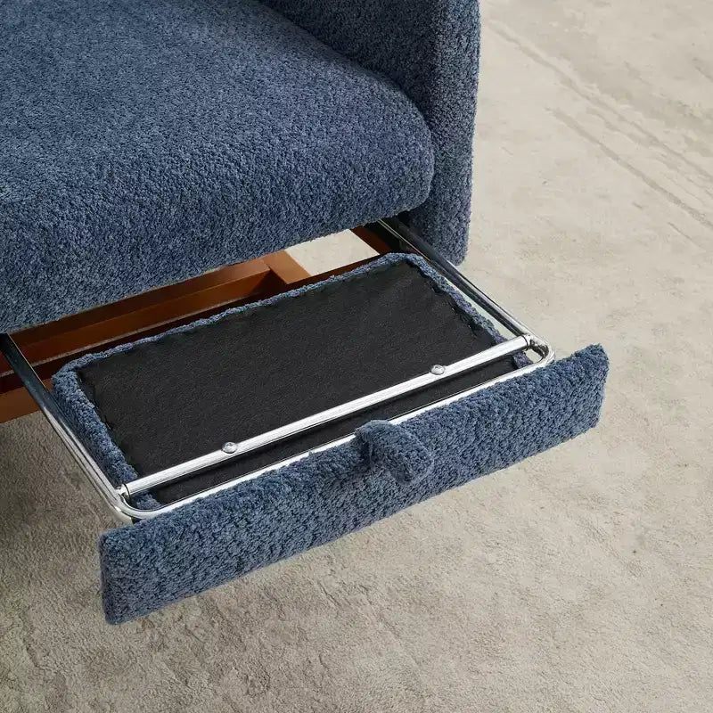 Fauteuil à bascule avec dossier haut, poche latérale et repose-pieds rétractable