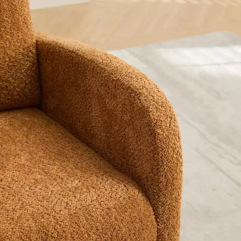 Fauteuil à bascule avec dossier haut, poche latérale et repose-pieds rétractable