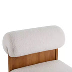 Fauteuil Boucle avec dossier roulé et base en bois massif