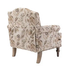 Fauteuil floral rembourré de style transitionnel avec dossier chameau et pieds en bois