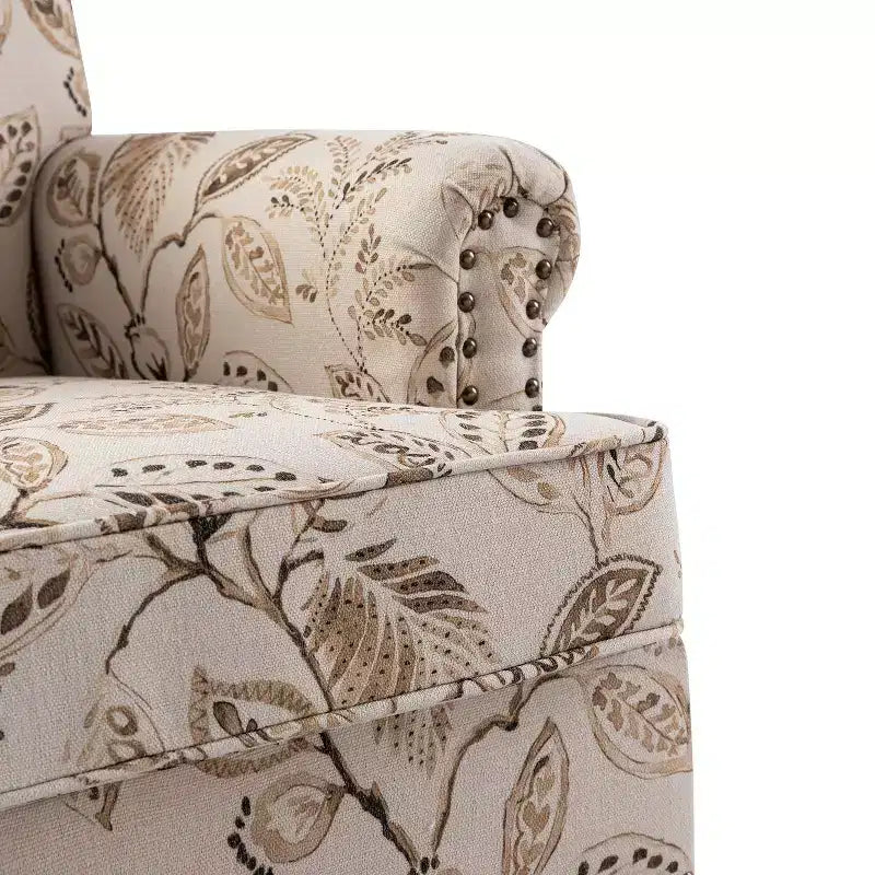 Fauteuil floral rembourré de style transitionnel avec dossier chameau et pieds en bois