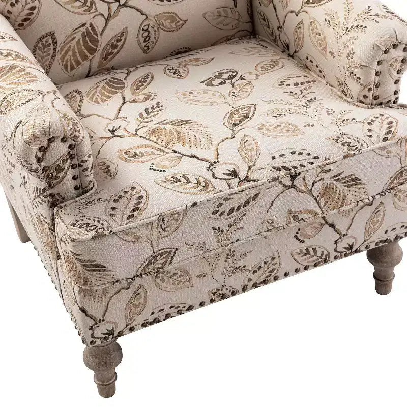 Fauteuil floral rembourré de style transitionnel avec dossier chameau et pieds en bois