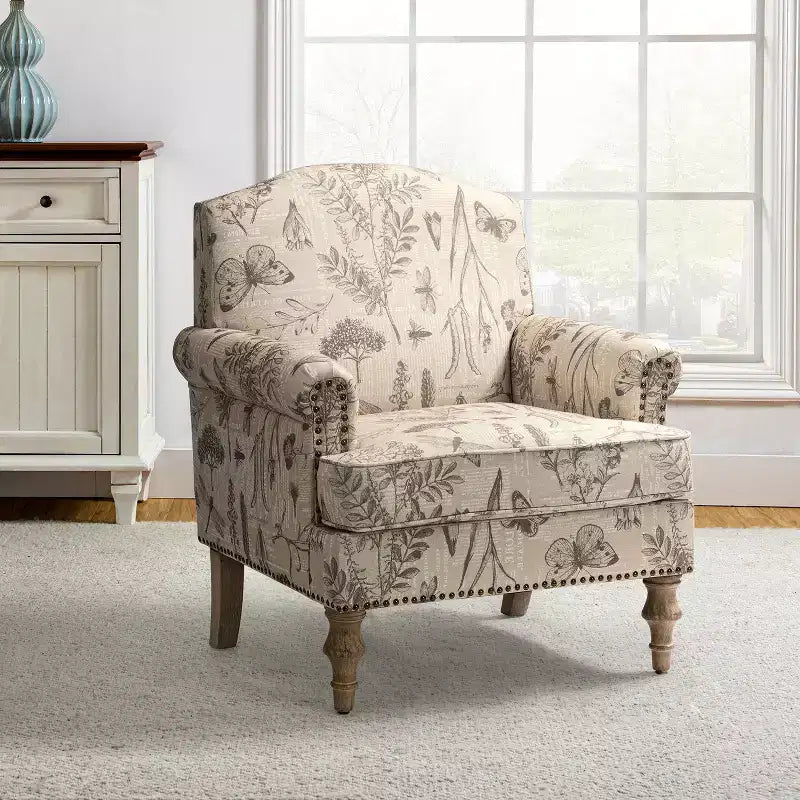 Fauteuil floral rembourré de style transitionnel avec dossier chameau et pieds en bois