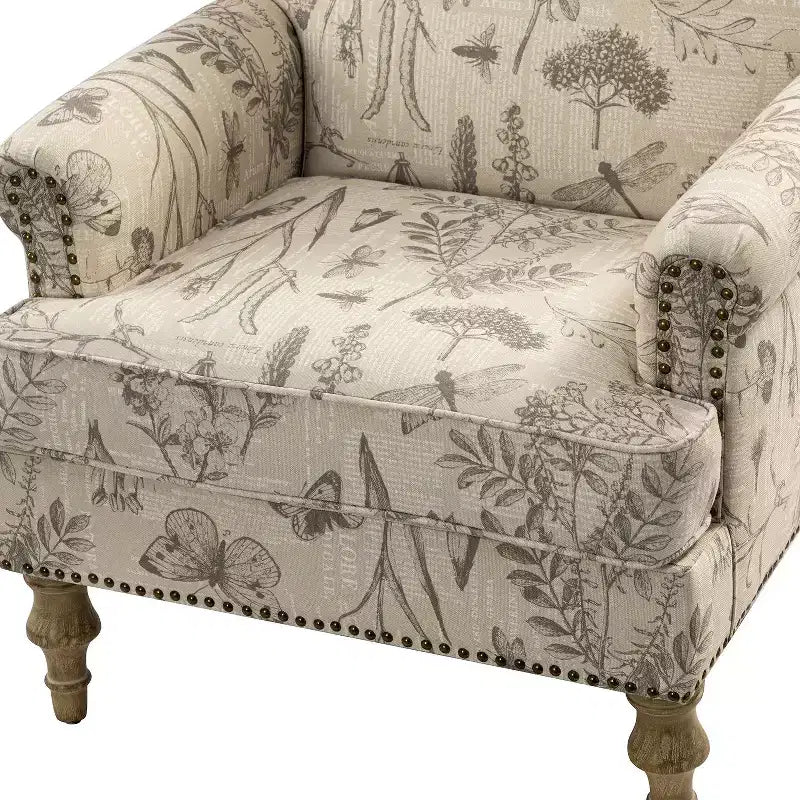 Fauteuil floral rembourré de style transitionnel avec dossier chameau et pieds en bois