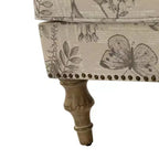 Fauteuil floral rembourré de style transitionnel avec dossier chameau et pieds en bois