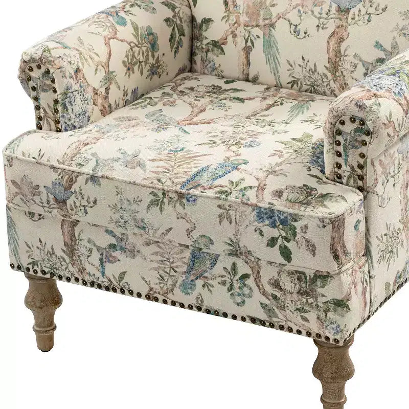 Fauteuil floral rembourré de style transitionnel avec dossier chameau et pieds en bois