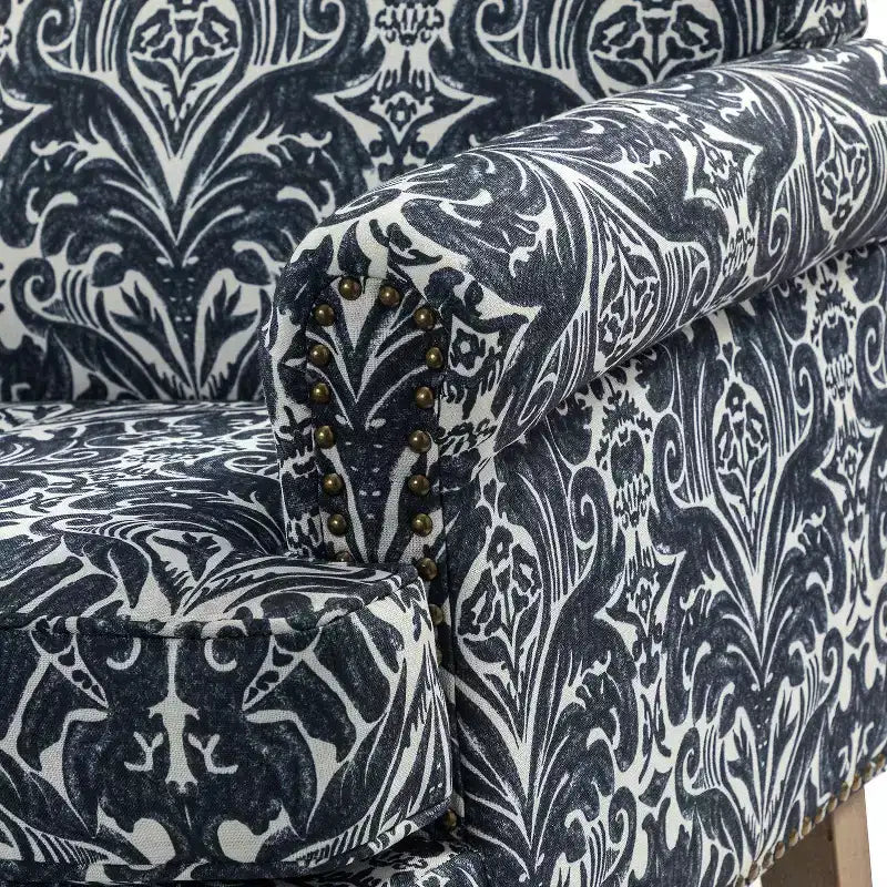 Fauteuil floral rembourré de style transitionnel avec dossier chameau et pieds en bois