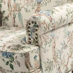 Fauteuil floral rembourré de style transitionnel avec dossier chameau et pieds en bois