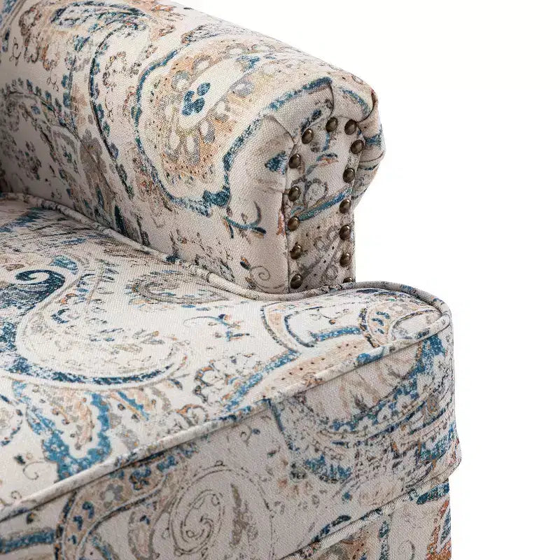 Fauteuil floral rembourré de style transitionnel avec dossier chameau et pieds en bois