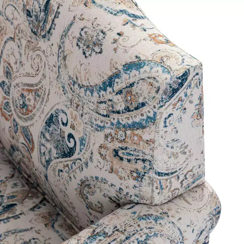 Fauteuil floral rembourré de style transitionnel avec dossier chameau et pieds en bois