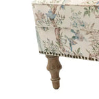 Fauteuil floral rembourré de style transitionnel avec dossier chameau et pieds en bois
